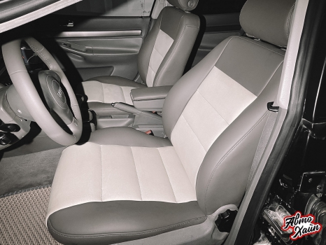 Audi A4. Перетяжка передних сидений, руля и подлокотника_3